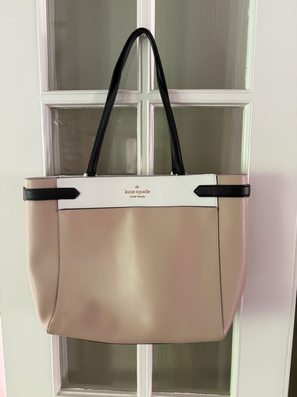 kate spade beige and white tote with black handles